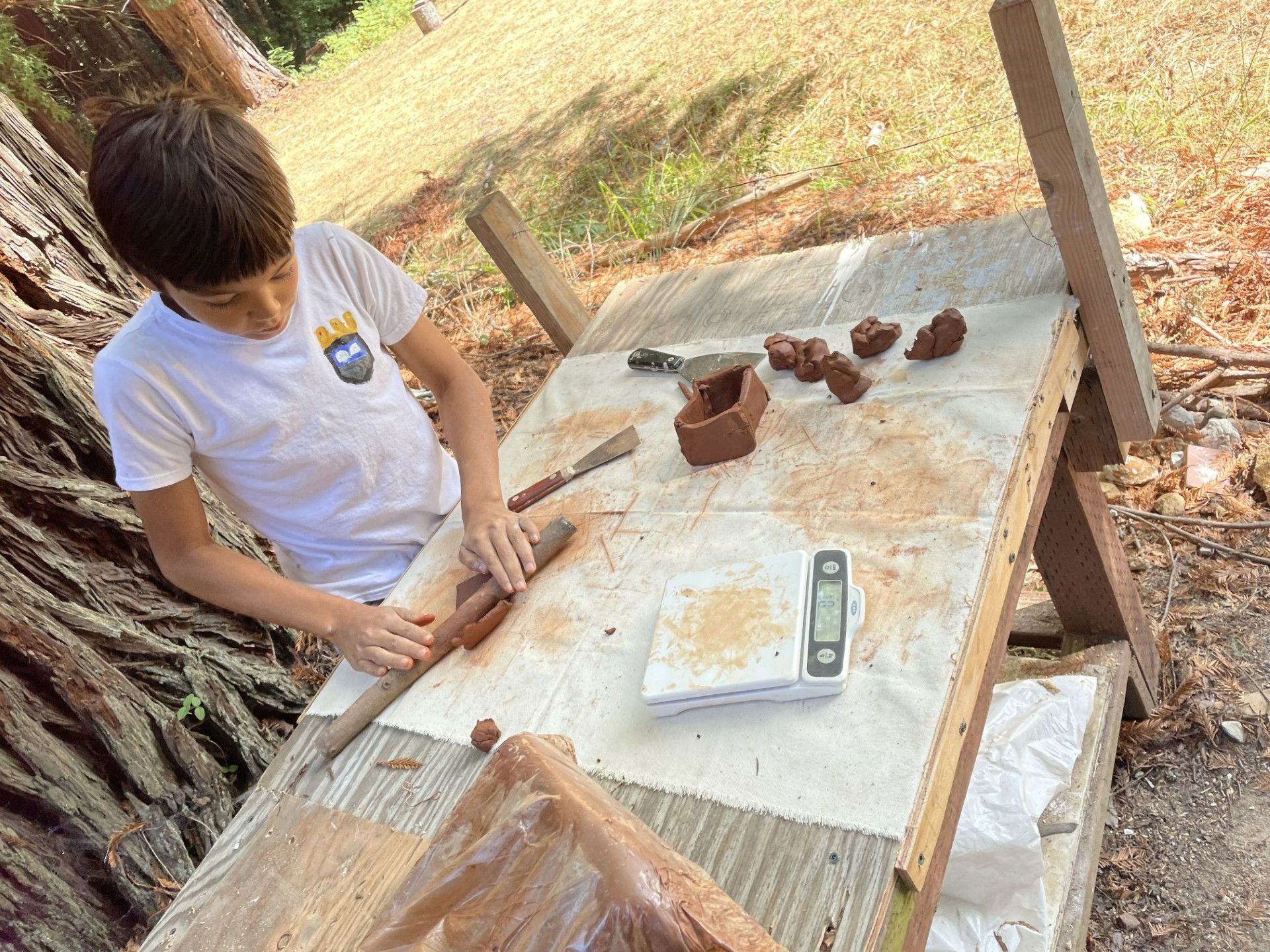 Students working with clay